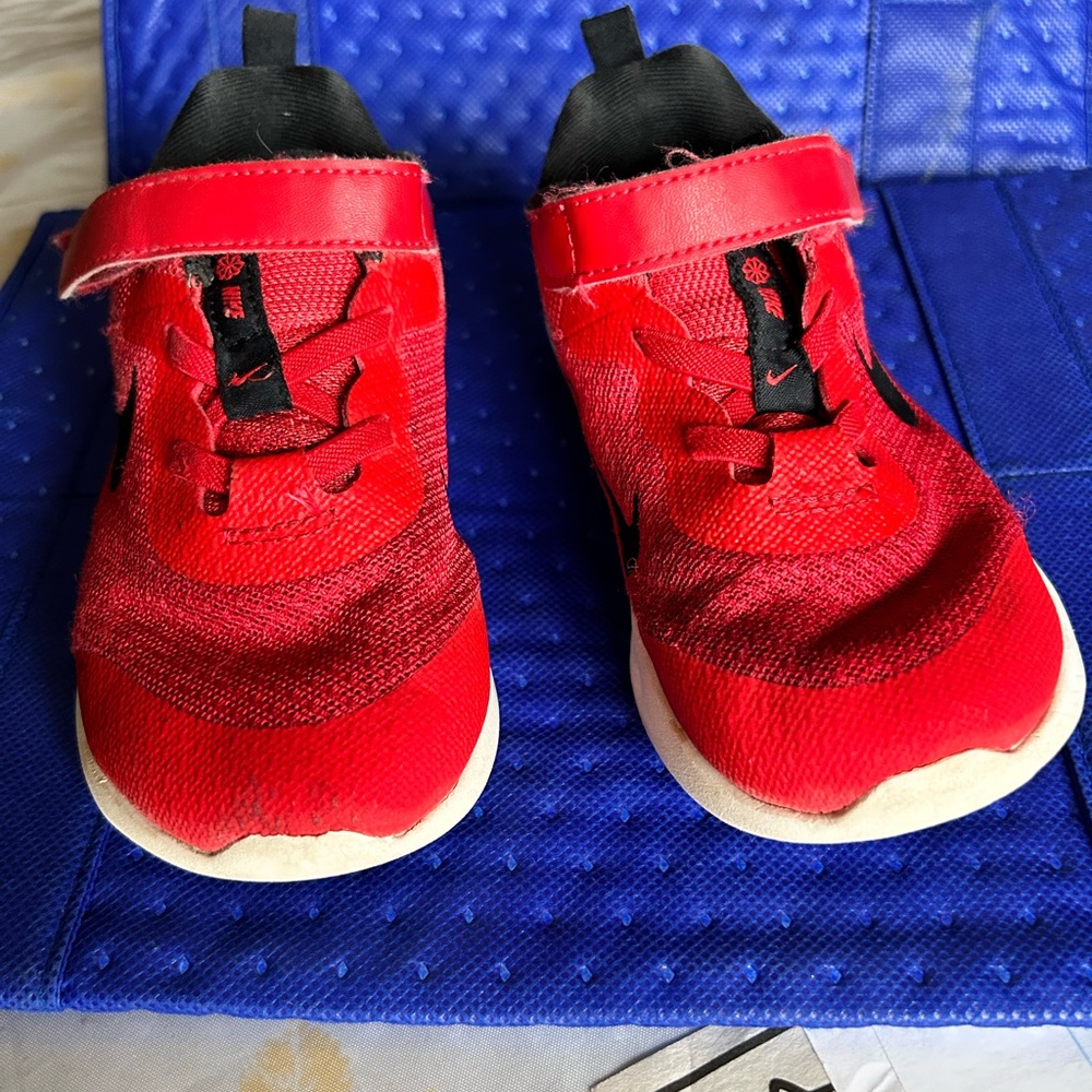 Toddler shoes, size 10. Red and white Nikes, also fairly new hardly worn.